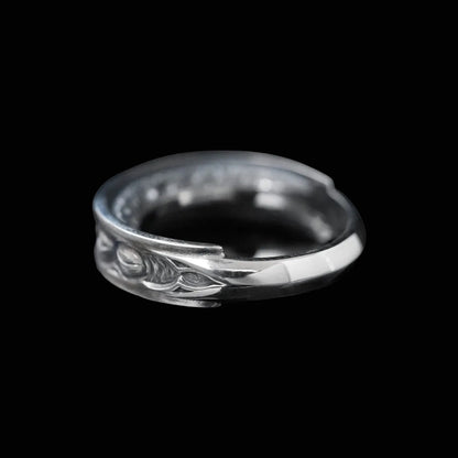 Side view of Lunation Eye Ring, highlighting the thick band and the carved, cratered texture of the lunar surface.