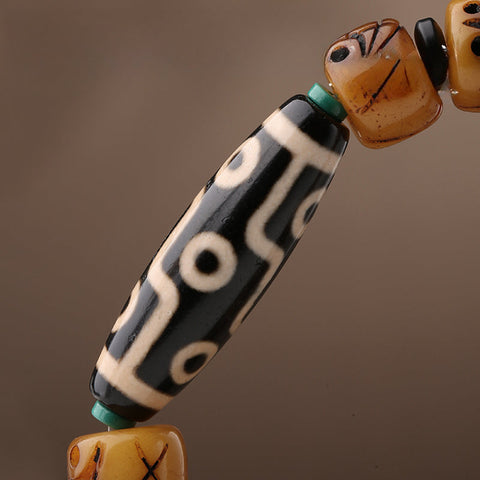 Nine-Eyed Dzi Bone Bracelet – Potala Palace Heritage Jewelry