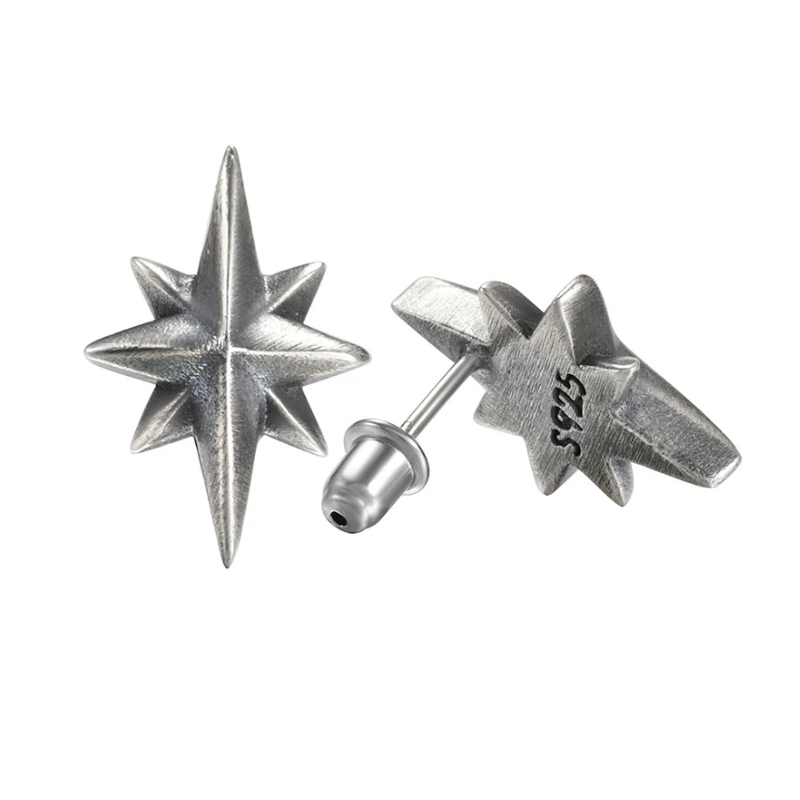 Handmade 925 sterling silver 8-pointed star stud earrings with an oxidized silver finish.