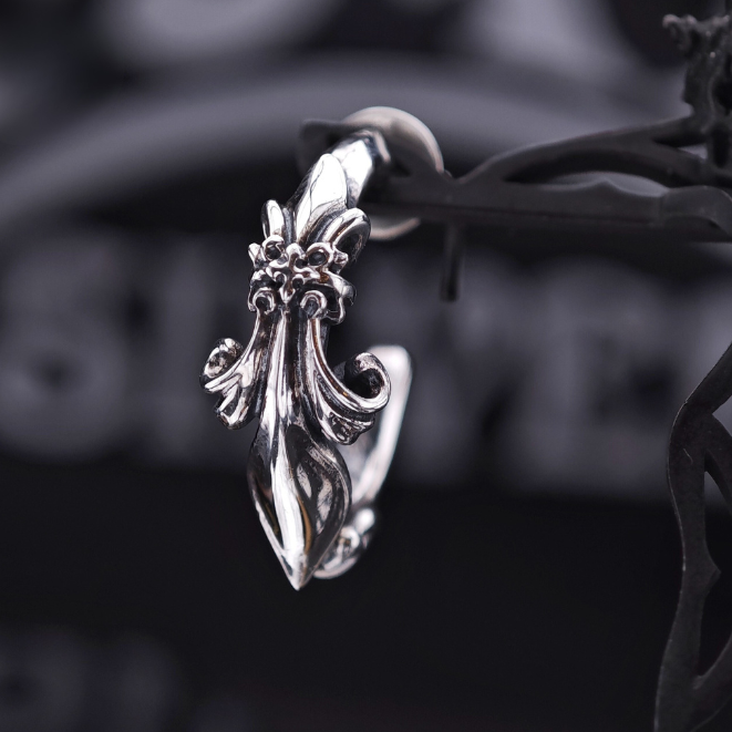 Handmade 925 sterling silver stud earring by QITREASURES, featuring an intricate Gothic Fleur-de-lis motif with a dark oxidized silver finish.