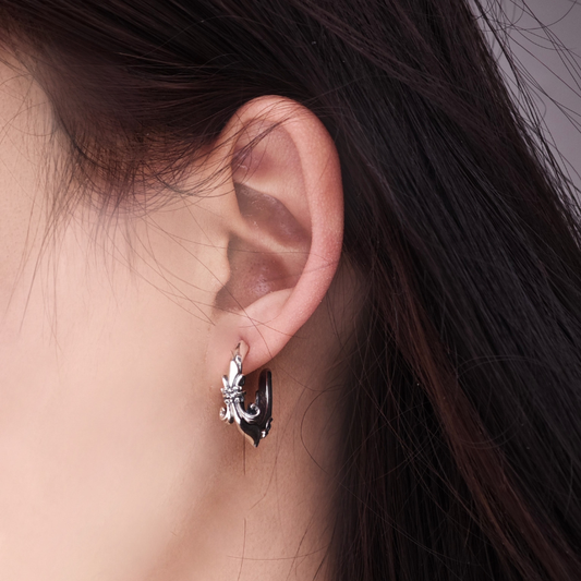 Handmade 925 sterling silver stud earring by QITREASURES, featuring an intricate Gothic Fleur-de-lis motif with a dark oxidized silver finish.