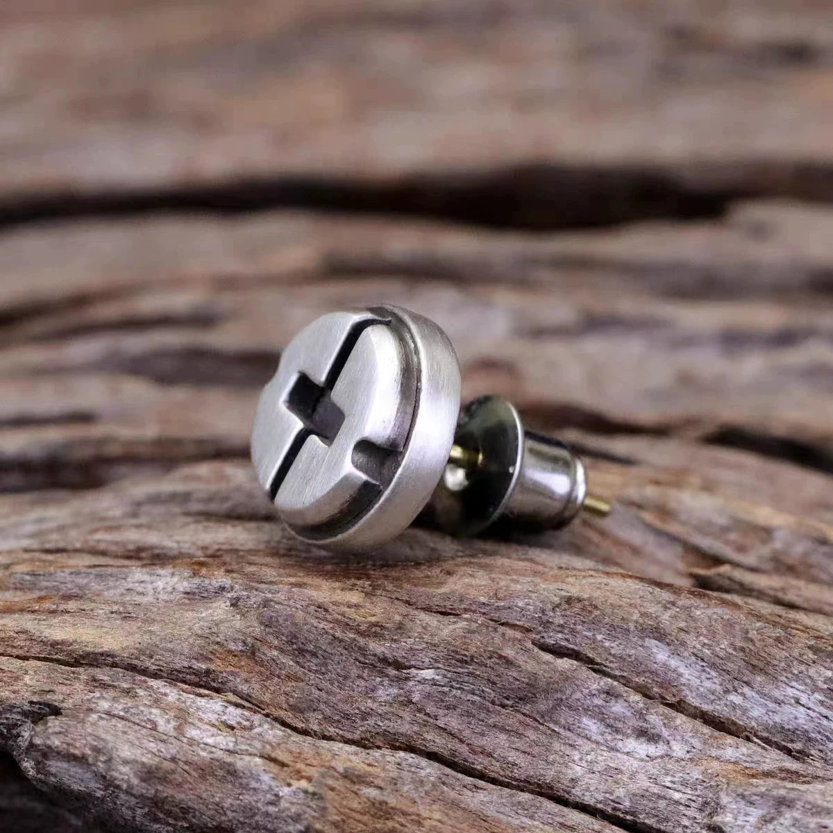 QITREASURES handmade 925 sterling silver stud earring in an industrial screw design with an oxidized silver finish.