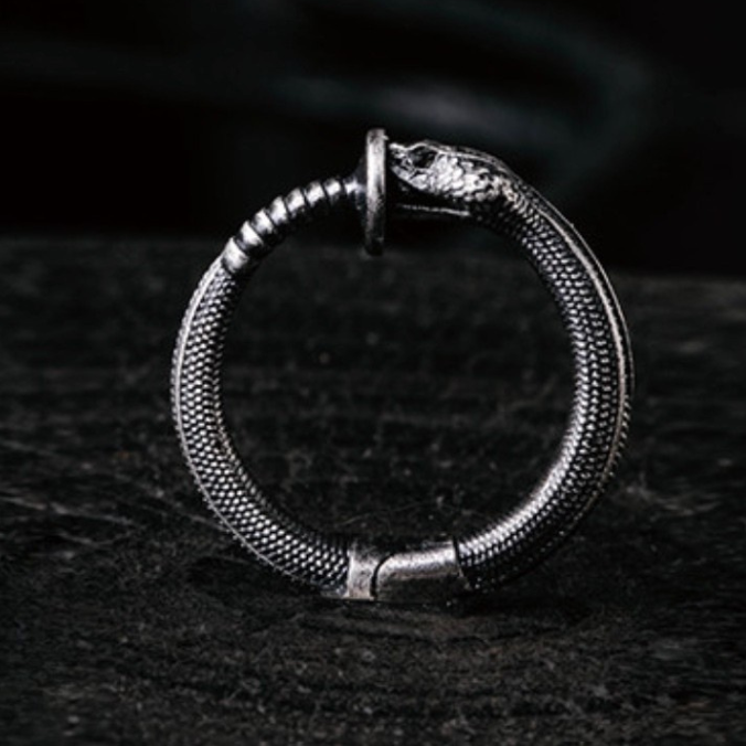 Handmade 925 sterling silver ear cuff in a gothic rattlesnake design with detailed scales and an oxidized silver finish.
