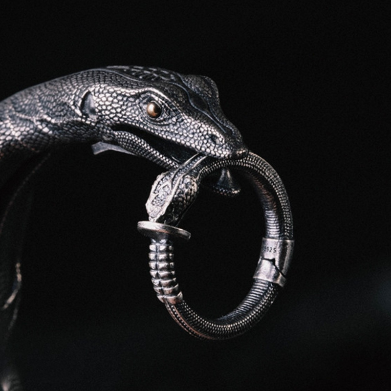 Handmade 925 sterling silver ear cuff in a gothic rattlesnake design with detailed scales and an oxidized silver finish.