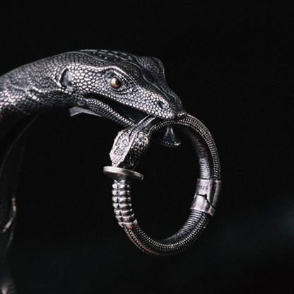 Handmade 925 sterling silver ear cuff in a gothic rattlesnake design with detailed scales and an oxidized silver finish.