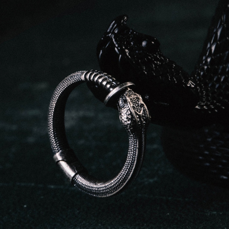 Handmade 925 sterling silver ear cuff in a gothic rattlesnake design with detailed scales and an oxidized silver finish.