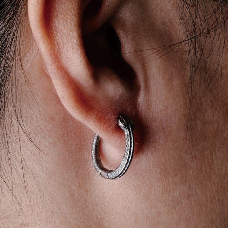 Handmade 925 sterling silver ear cuff in a gothic rattlesnake design with detailed scales and an oxidized silver finish.