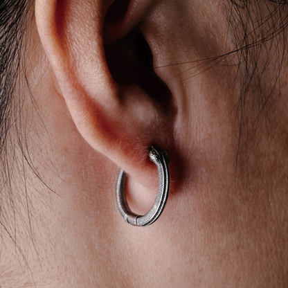 Handmade 925 sterling silver ear cuff in a gothic rattlesnake design with detailed scales and an oxidized silver finish.