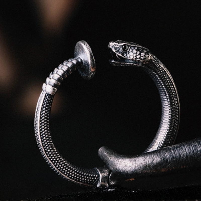 Handmade 925 sterling silver ear cuff in a gothic rattlesnake design with detailed scales and an oxidized silver finish.