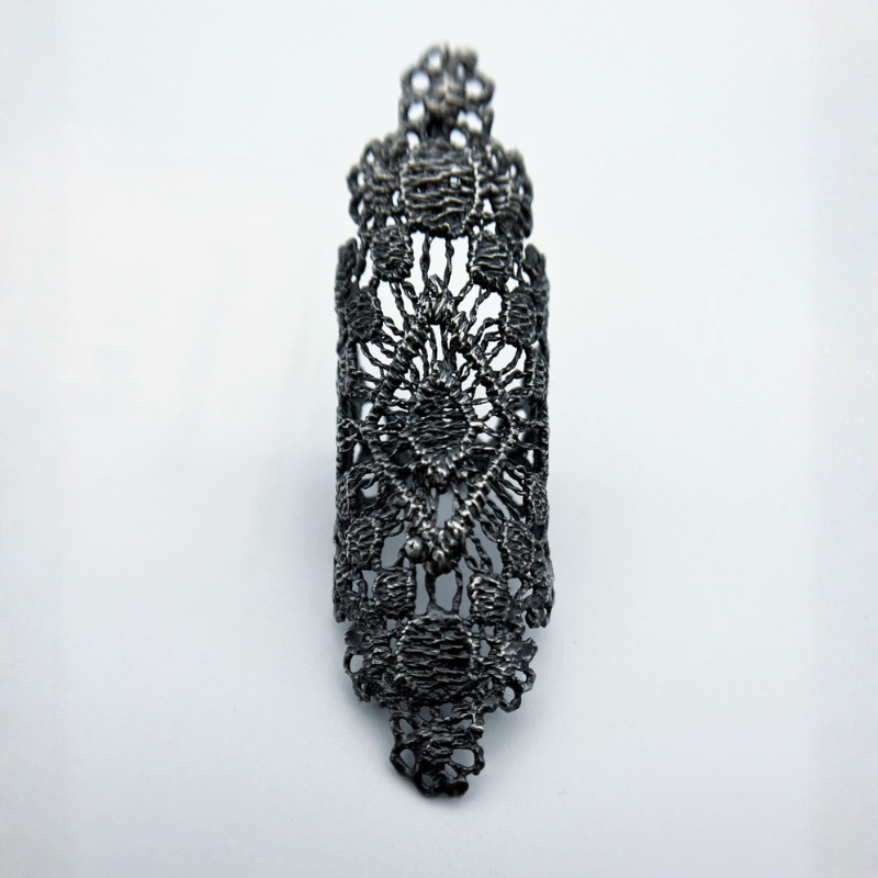 Intricate 925 sterling silver ring featuring handmade oxidized relic tracery and Gothic cathedral window inspired openwork.